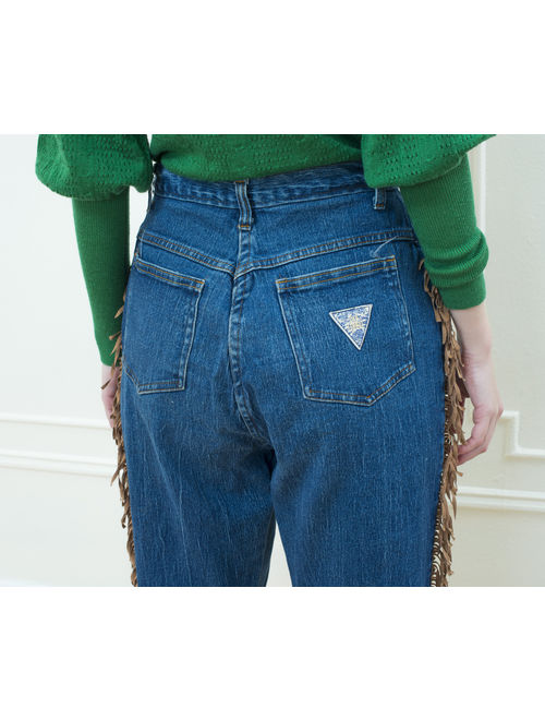 80s fringe high waisted jeans small | 28 waist western leather fringe jeans | high rise tapered rodeo jeans | cap ferrat high waist jeans