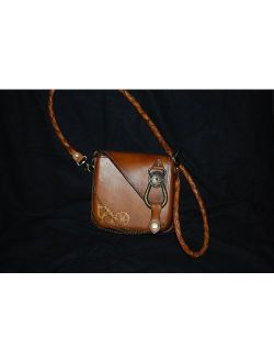 Leather and brass bag