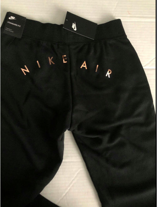 gold and black nike joggers