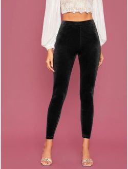 SHEIN SXY Solid Cut Out Back Leggings