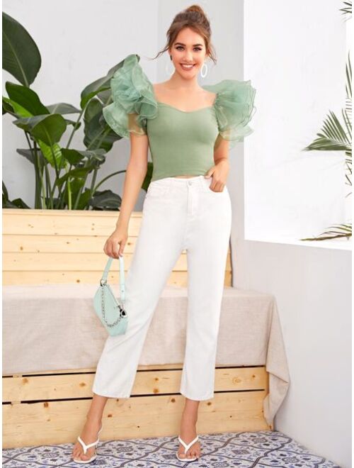 exaggerated ruffle top