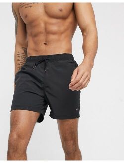 swim trunks with small logo in black