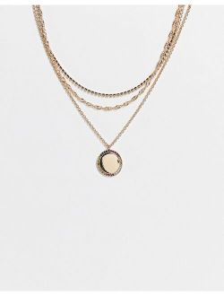 multirow necklace with rainbow pave pendant in gold