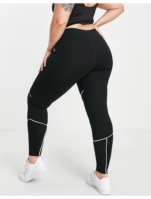 ellesse plus leggings in black with seam detail