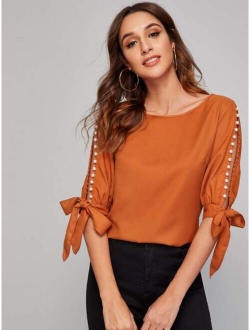 Pearl Beaded Split Sleeve Knot Cuff Top