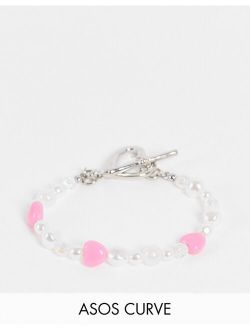 Curve bracelet with iridescent beads and heart t-bar