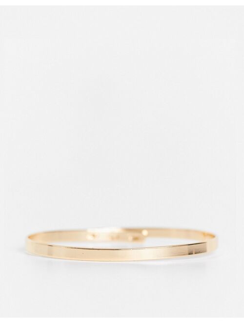 Asos Design Curve bangle bracelet in minimal design in gold tone