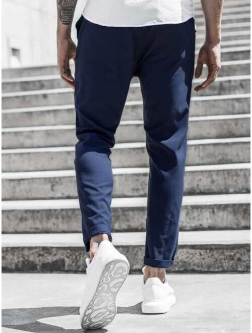 Men Blue Solid Tapered Pants