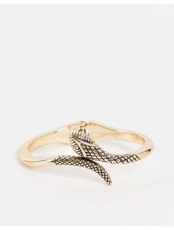 bangle bracelet with snake design in gold tone
