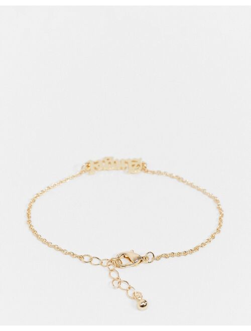 Asos Design chain bracelet with angel gothic font in gold tone