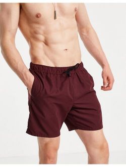 swim shorts in burgundy mid length