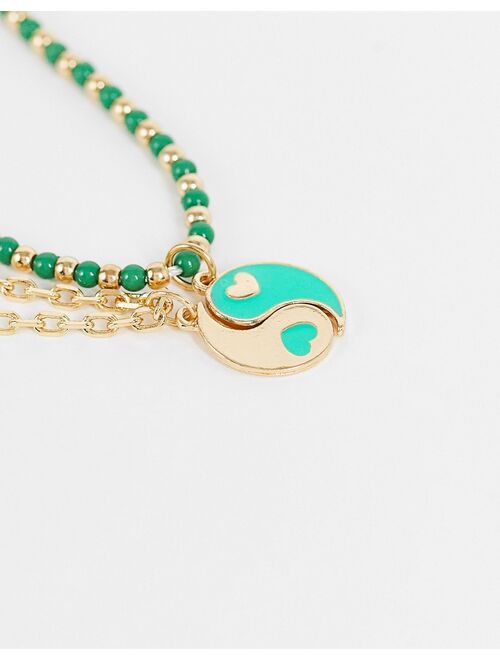 Reclaimed Vintage inspired unisex 90's anklet with yin yang charms in gold and green