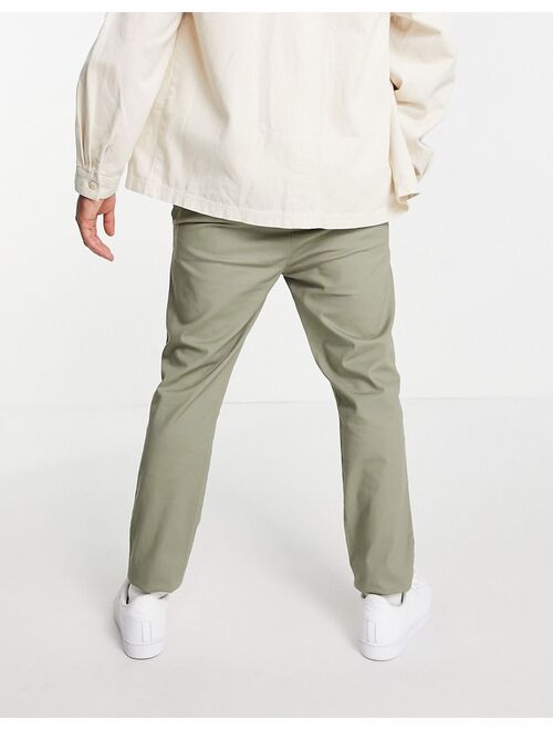 Asos Design skinny chinos with elasticized waist and pin tuck in light khaki