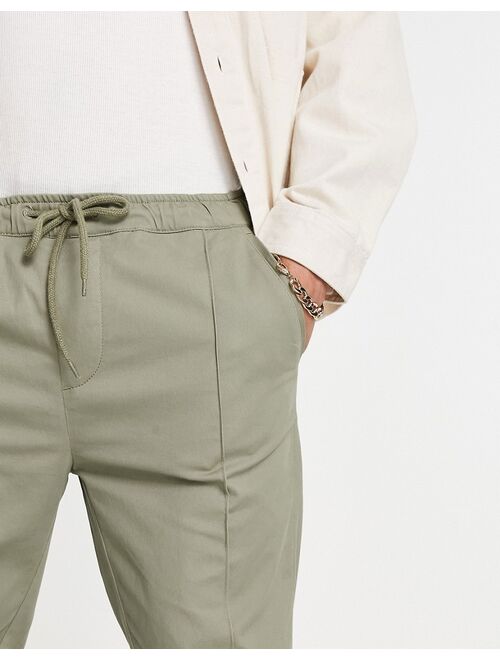 Asos Design skinny chinos with elasticized waist and pin tuck in light khaki