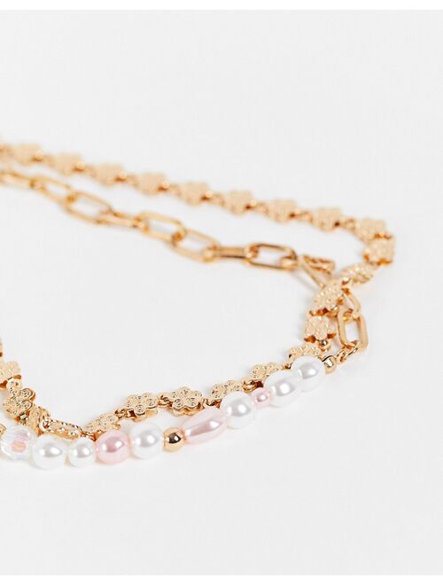 Reclaimed vintage inspired multirow necklace with mixed chain and pastel faux pearls in gold