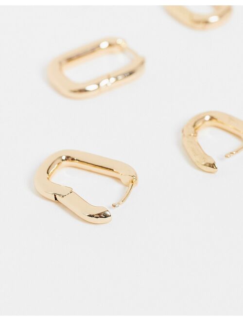 Asos Design pack of 2 hoop earrings in oval hinge in gold tone