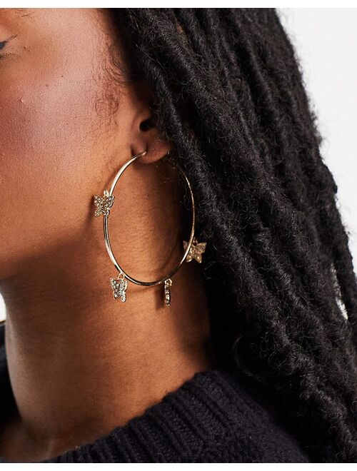 Asos Design hoop earrings with crystal butterfly charms in gold tone