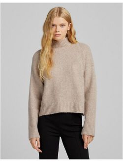 roll neck jumper in beige