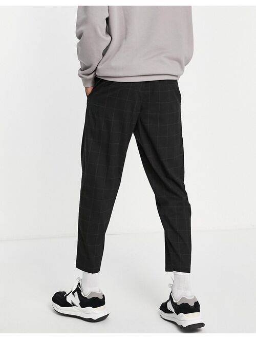 Bershka loose fit check formal pants in black