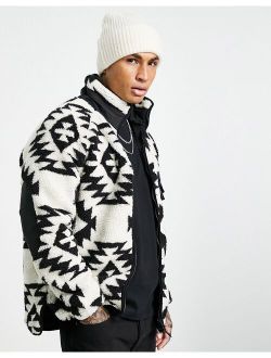 oversized fleece in geo pattern print