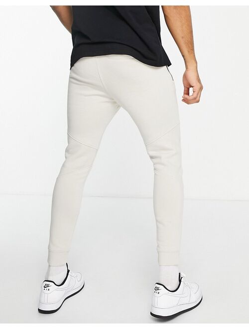 Bershka pique sweatpants in ecru