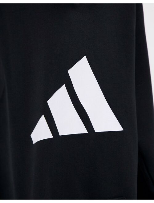 Adidas winterized hoodie with large logo in black