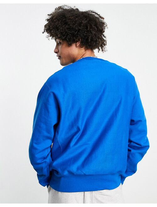 Champion small logo sweatshirt in blue