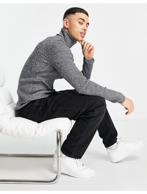 Asos Design muscle fit ribbed rollneck sweater in black and white twist