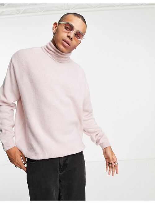 Asos Design fluffy knit roll neck sweater in pink