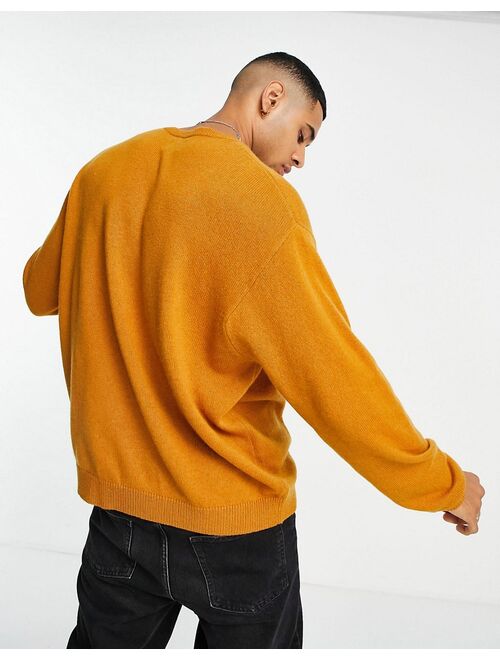 Asos Design oversized lambswool sweater in mustard