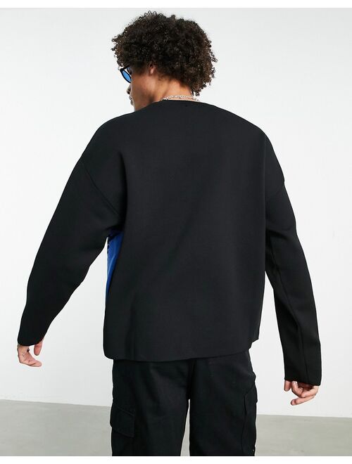 Bershka oversized printed sweater in black