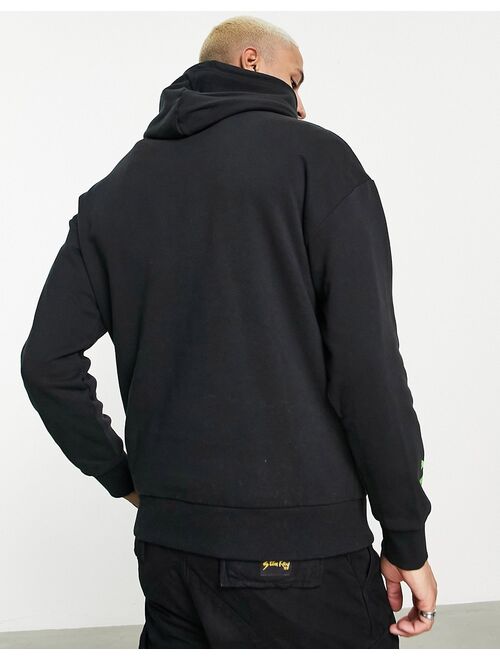 Puma x Santa Cruz graphic hoodie in black and lime green