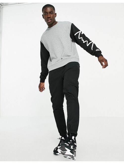 Puma Hoops raglan sweatshirt in black and gray