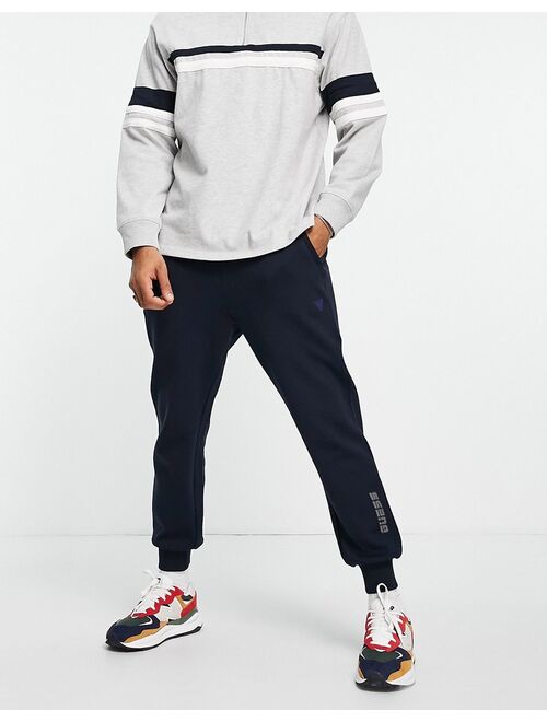 Guess active cuffed sweatpants with leg logo in navy