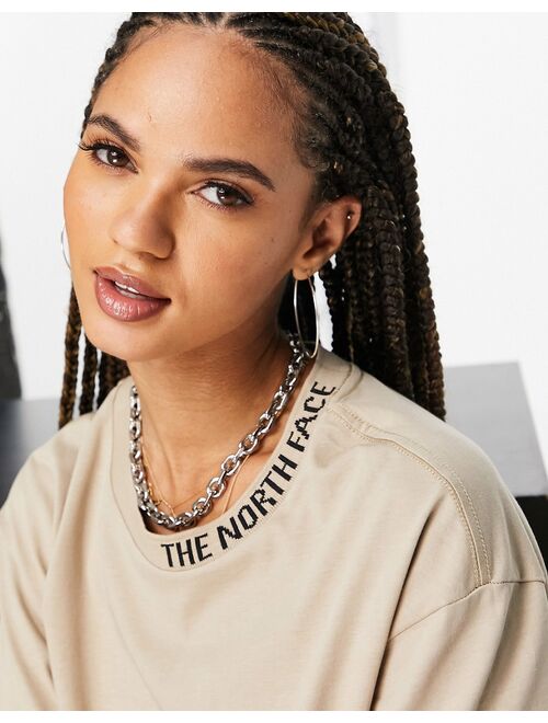 The North Face Zumu cropped t-shirt in beige Exclusive at ASOS