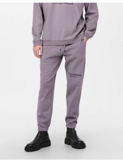 branded logo oversized sweatpants in purple - part of a set