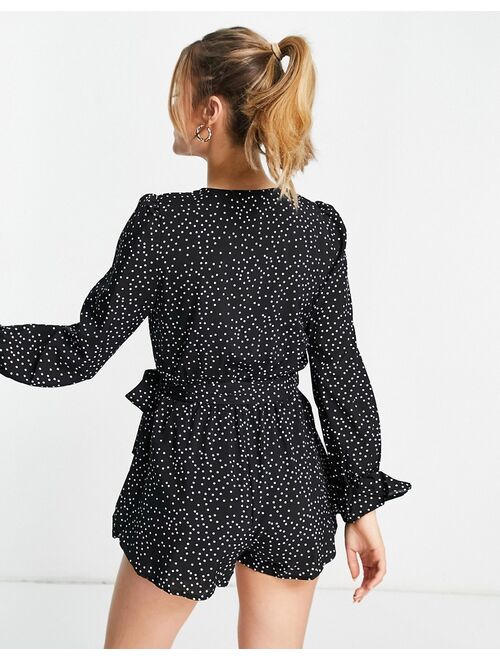 In The Style x Dani Dyer flippy hem romper in black polka print