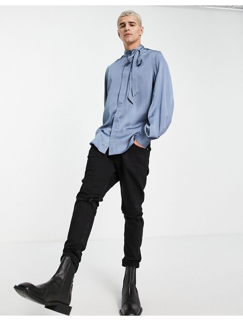 Asos Design satin shirt with tie neck and blouson volume sleeve in blue