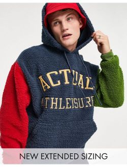 ASOS Actual oversized hoodie in teddy fleece with color block sleeves and logo in navy