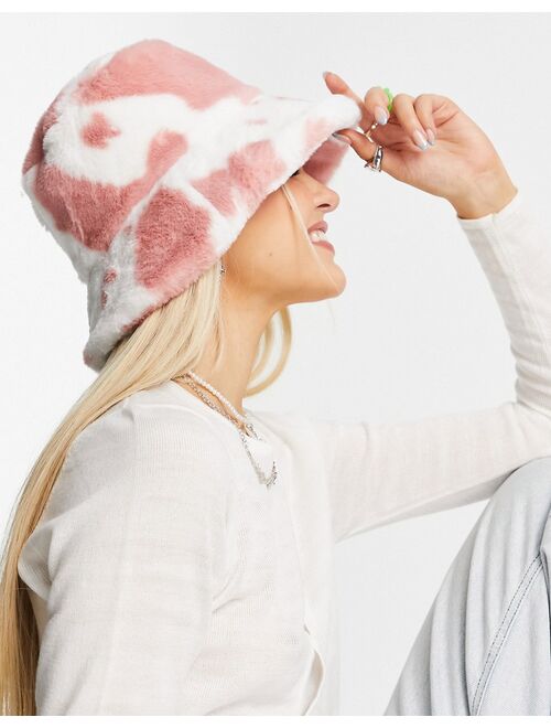 Asos Design roll back bucket hat in pink cow print