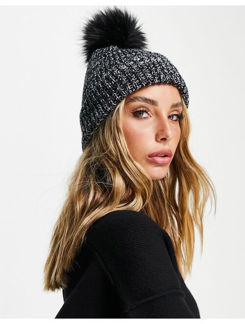 Asos Design mixed knit pom beanie in black and white