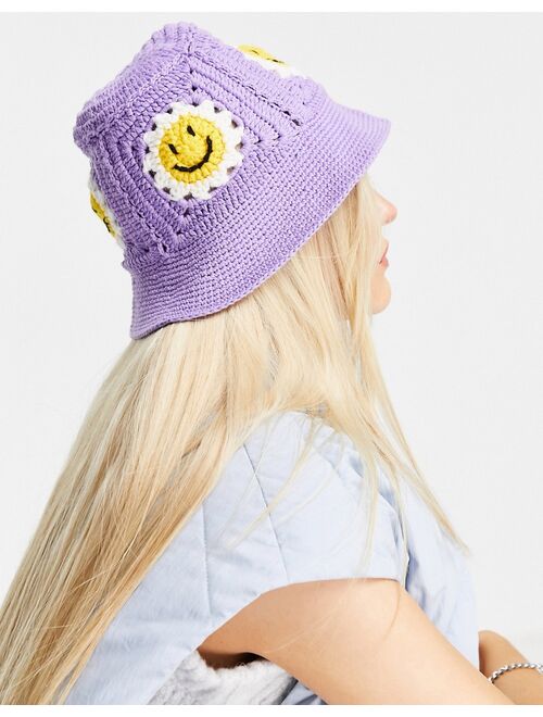 Asos Design crochet bucket hat with happy detail