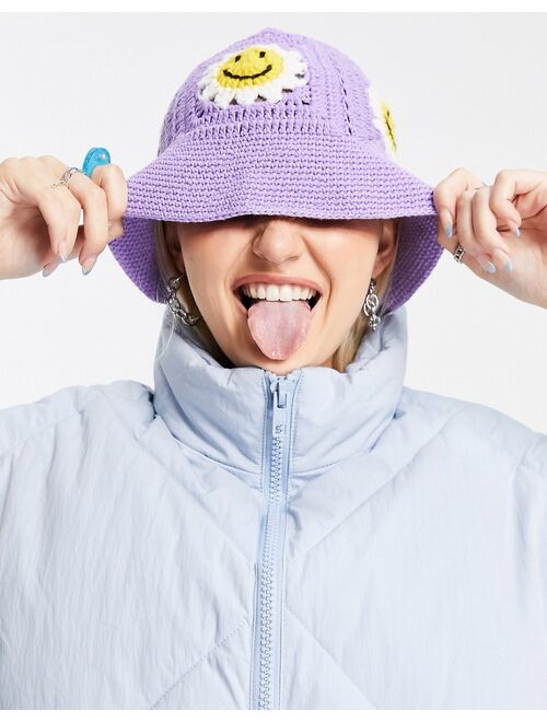 Asos Design crochet bucket hat with happy detail