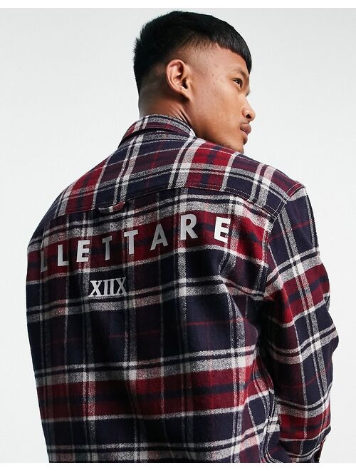 Asos Design 90s oversized shirt in brushed flannel check with back text print