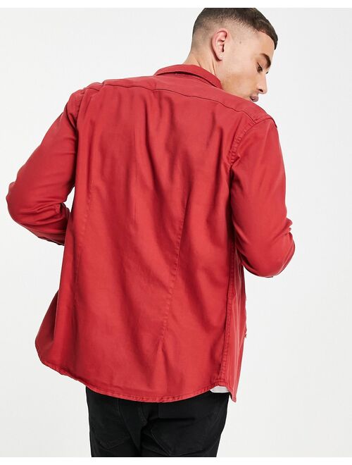 Asos Design slim fit long sleeve denim shirt in red