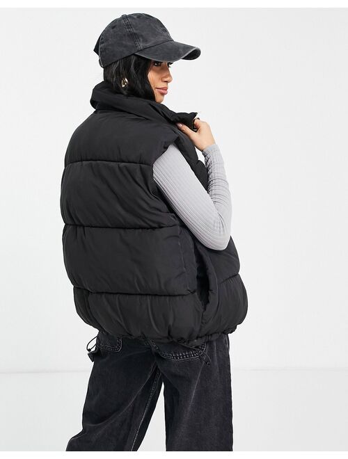 Topshop Petite oversized sleeveless puffer vest in black