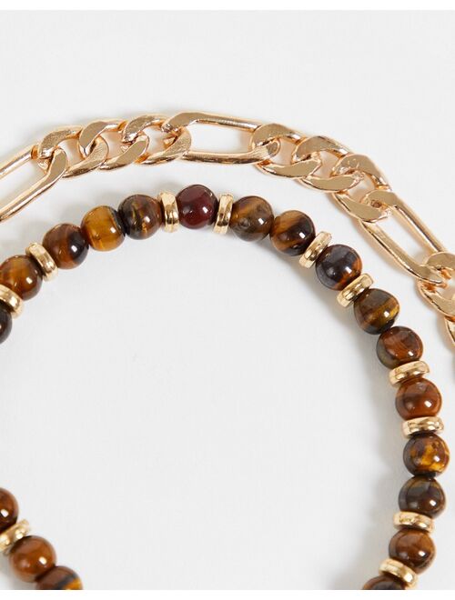 Asos Design 2 pack bracelet set with tigers eye beads and gold tone figaro chain