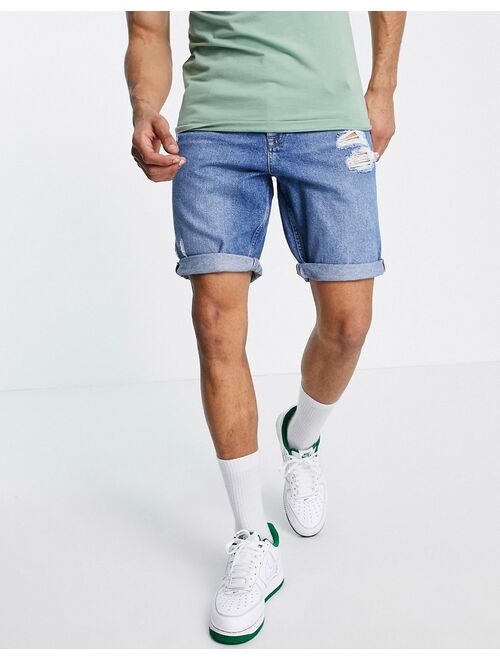 ASOS DESIGN slim denim shorts in mid wash with rips