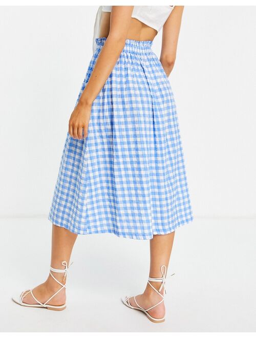 ASOS DESIGN midi skirt with pocket detail in seersucker blue & white gingham print