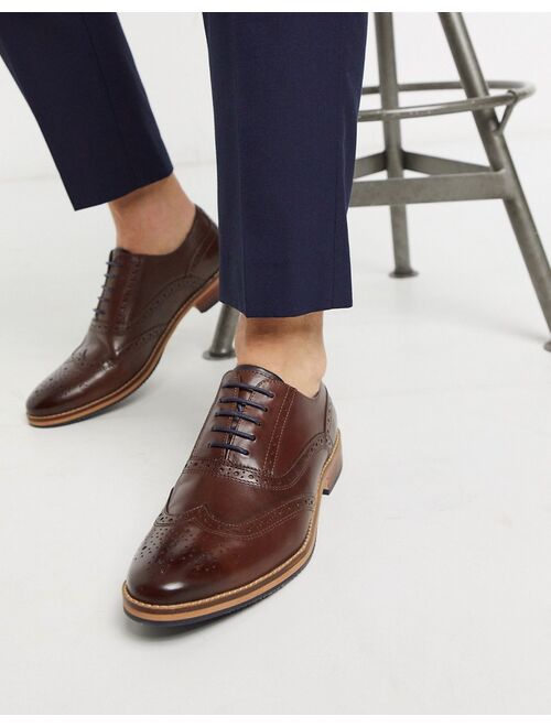 ASOS DESIGN brogue shoes in brown leather with natural sole and color details